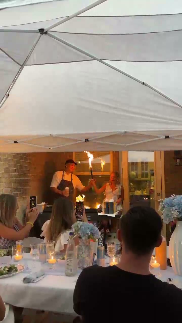 Guests under the tent at a private event