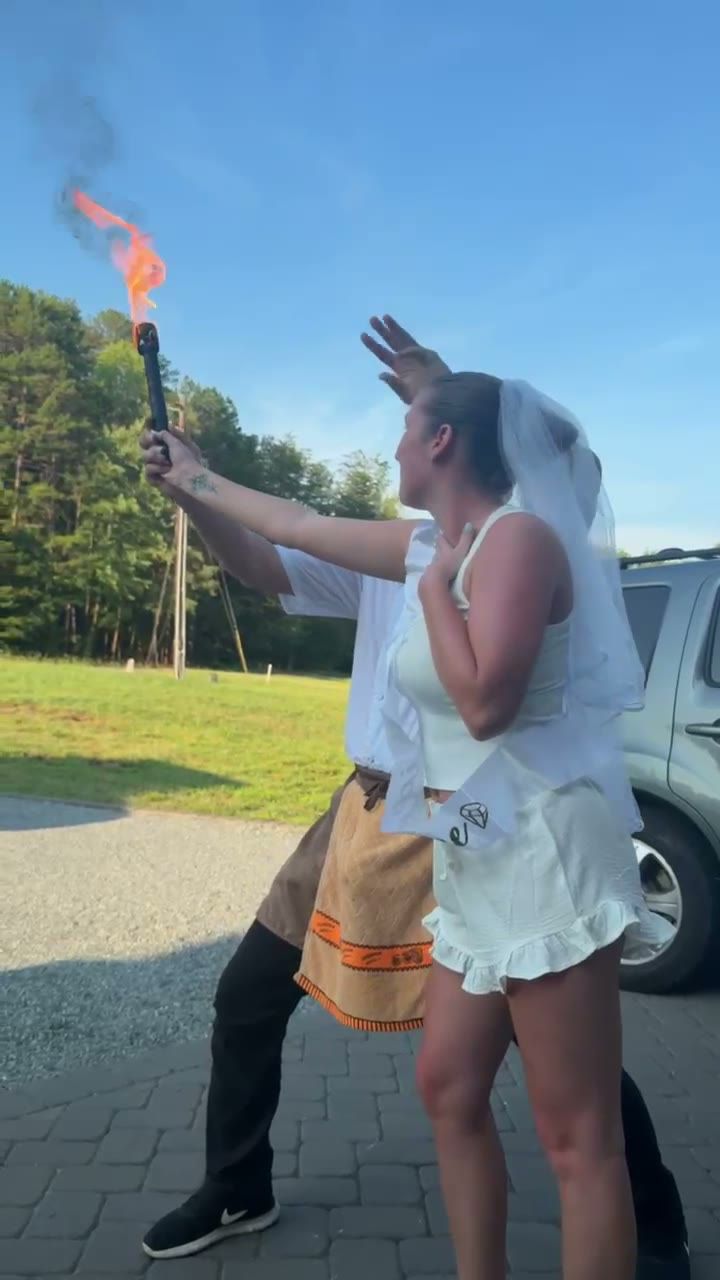 Bride holding a fire torch